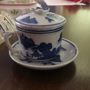 Blue and white coffee cup with plate